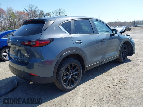 2024 Mazda CX-5 2.5 S Carbon Edition with VIN JM3KFBCL2R0456935, listed as a IAAI auction lot 41925947 with 28,586 mi miles. Bid and sale history available at carsss.com. Image 4.
