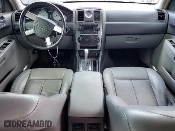 2007 Chrysler 300 Limited with VIN 2C3KK53G97H771740, listed as a Copart auction lot 79426564 with 132,823 mi miles and Salvage Title. Bid and sale history available at carsss.com. Image 8.