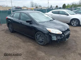 2012 Ford Focus SE with VIN 1FAHP3F27CL112277, listed as a IAAI auction lot 42053243 with 104,885 mi miles. Bid and sale history available at carsss.com. Image 1.