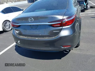 2020 Mazda 6 Grand Touring with VIN JM1GL1TY0L1522025, listed as a IAAI auction lot 41876429 with 68,101 mi miles and . Bid and sale history available at DreamBid. Image 16.