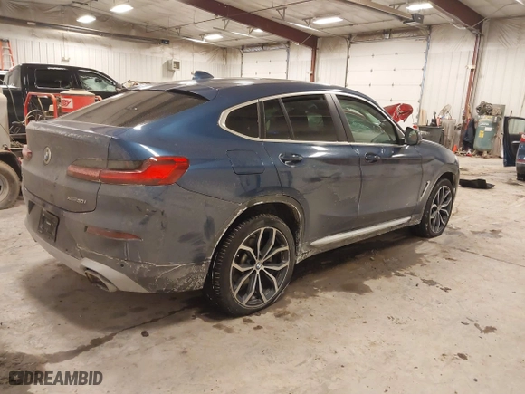 2023 BMW X4 xDrive30i with VIN 5UX33DT01P9R31277, listed as a IAAI auction lot 41618617 with 23,952 mi miles. Bid and sale history available at carsss.com. Image 4.