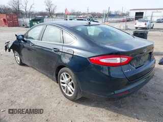 2014 Ford Fusion SE with VIN 3FA6P0H72ER156982, listed as a IAAI auction lot 41865154 with 215,319 mi miles and . Bid and sale history available at DreamBid. Image 3.