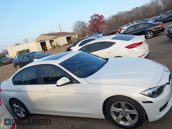 2014 BMW 3 Series 328i xDrive with VIN WBA3B5C52EF958635, listed as a IAAI auction lot 40916777 with 143,975 mi miles. Bid and sale history available at carsss.com. Image 12.
