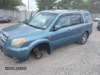 2006 Honda Pilot EX-L with VIN 2HKYF18566H517113, listed as a IAAI auction lot 41917755 with 180,398 mi miles and . Bid and sale history available at DreamBid. Image 2.