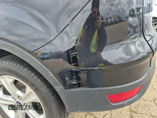2016 Ford Escape SE z VIN 1FMCU9GX9GUC01824, wystawiony jako IAAI lot #42396853 z przebiegiem 57 608 mil mil oraz . Historia ofert i sprzedaży dostępna na DreamBid. Obrazek 16.