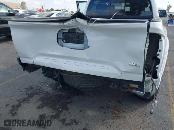 2020 Toyota Tacoma SR5 with VIN 3TMBZ5DN7LM026596, listed as a IAAI auction lot 40705410 with 123,489 mi miles and . Bid and sale history available at DreamBid. Image 6.