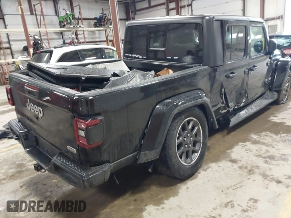 2020 Jeep Gladiator Overland with VIN 1C6HJTFG0LL182931, listed as a IAAI auction lot 41734803 with 75,525 mi miles and . Bid and sale history available at DreamBid. Image 4.