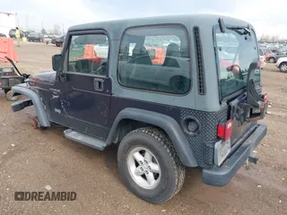 1999 Jeep Wrangler Sport with VIN 1J4FY19S9XP419330, listed as a IAAI auction lot 41913314 with 167,176 mi miles. Bid and sale history available at carsss.com. Image 3.