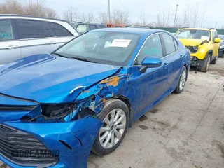 2020 Toyota Camry LE with VIN 4T1C11AKXLU401967, listed as a IAAI auction lot 41619121 with 94,962 mi miles. Bid and sale history available at carsss.com. Image 6.