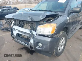 2014 Nissan Titan Pro-4X with VIN 1N6BA0EC3EN514358, listed as a IAAI auction lot 41636363 with 166,201 mi miles and . Bid and sale history available at DreamBid. Image 6.
