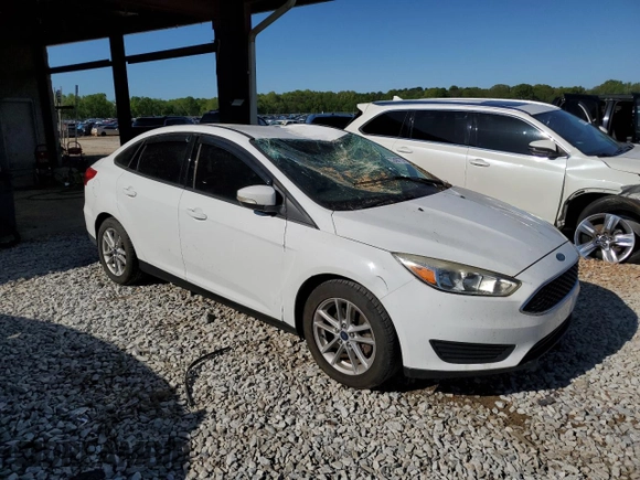 2017 Ford Focus SE with VIN 1FADP3FE8HL292272, listed as a Copart auction lot 52407755 with 127,038 mi miles and Salvage Title. Bid and sale history available at carsss.com. Image 4.