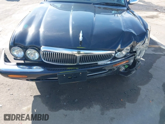 2003 Jaguar XJ 8 with VIN SAJDA14C03LF58706, listed as a IAAI auction lot 41619740 with 95,293 mi miles and . Bid and sale history available at DreamBid. Image 12.