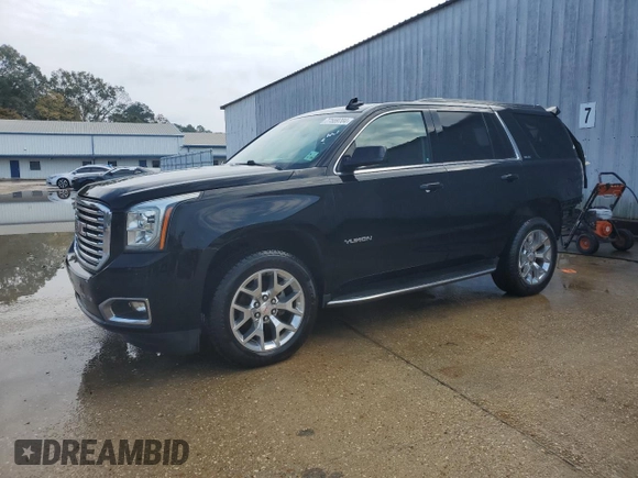 2017 GMC Yukon SLE with VIN 1GKS1AKC3HR307466, listed as a Copart auction lot 77559704 with 130,274 mi miles and Salvage Title. Bid and sale history available at carsss.com. Image 1.