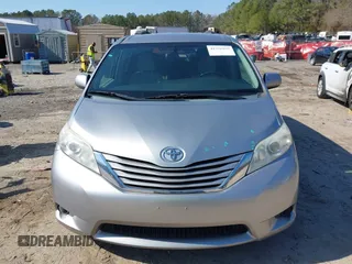 2015 Toyota Sienna LE AAS with VIN 5TDKK3DC4FS557542, listed as a IAAI auction lot 41756997 with 256,000 mi miles. Bid and sale history available at carsss.com. Image 12.