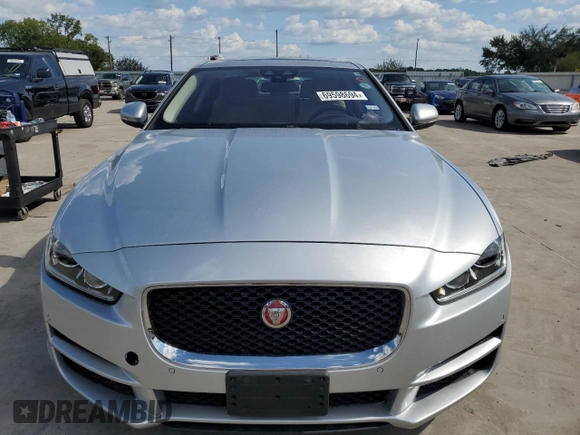 2017 Jaguar XE with VIN SAJAD4BN8HA970405, listed as a Copart auction lot 69598694 with 111,865 mi miles and Salvage Title. Bid and sale history available at DreamBid. Image 5.