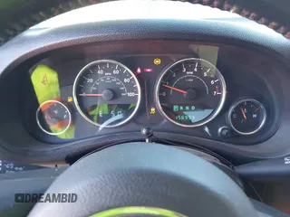 2012 Jeep Wrangler Unlimited Sport z VIN 1C4BJWDG8CL102486, wystawiony jako IAAI lot #41386649 z przebiegiem 156 993 mil mil oraz . Historia ofert i sprzedaży dostępna na DreamBid. Obrazek 7.