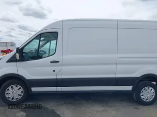 2019 Ford Transit with VIN 1FTYE2CM2KKB21876, listed as a IAAI auction lot 42026853 with Not provided miles and . Bid and sale history available at DreamBid. Image 14.