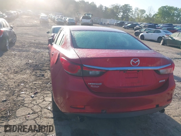 2016 Mazda 6 i Sport with VIN JM1GJ1U53G1433114, listed as a IAAI auction lot 41985647 with 193,142 mi miles and . Bid and sale history available at DreamBid. Image 16.