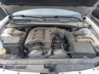 2010 Dodge Charger SXT with VIN 2B3CA3CV0AH287289, listed as a IAAI auction lot 42036118 with 283,080 mi miles. Bid and sale history available at carsss.com. Image 10.