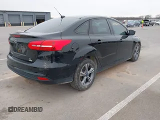 2017 Ford Focus SE with VIN 1FADP3FE4HL307110, listed as a IAAI auction lot 41992037 with 54,380 mi miles and . Bid and sale history available at DreamBid. Image 4.