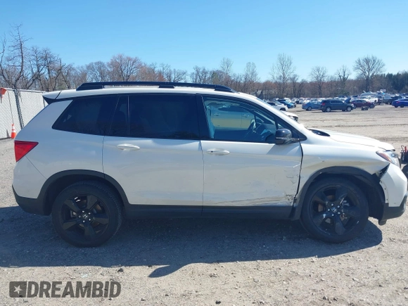 2019 Honda Passport Elite z VIN 5FNYF8H04KB005307, wystawiony jako IAAI lot #41828725 z przebiegiem 61 864 mil mil oraz . Historia ofert i sprzedaży dostępna na DreamBid. Obrazek 13.