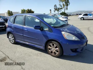 2009 Honda Fit Sport w/Navi with VIN JHMGE88639S037082, listed as a Copart auction lot 53303755 with 213,931 mi miles and Salvage Title. Bid and sale history available at carsss.com. Image 4.