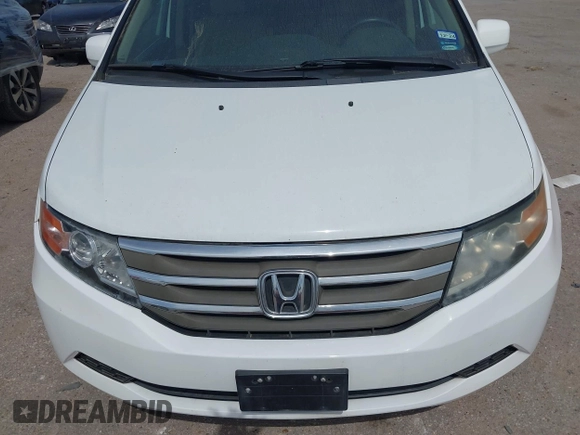 2013 Honda Odyssey EX z VIN 5FNRL5H44DB024764, wystawiony jako IAAI lot #42256598 z przebiegiem 169 708 mil mil oraz . Historia ofert i sprzedaży dostępna na DreamBid. Obrazek 12.