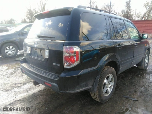 2008 Honda Pilot EX-L with VIN 5FNYF18578B046963, listed as a IAAI auction lot 41712487 with 203,673 mi miles. Bid and sale history available at carsss.com. Image 4.