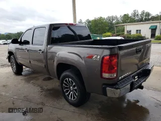 2012 GMC Sierra 1500 SLT with VIN 3GTP2WE74CG310914, listed as a Copart auction lot 56049905 with 106,882 mi miles and Salvage title. Bid and sale history available at DreamBid. Image 2.