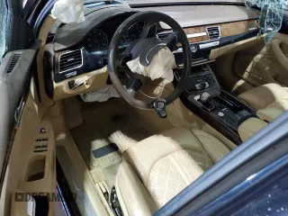 2016 Audi A8 Sport с VIN WAU43AFDXGN004897, выставлен на аукционе Copart как лот 63614425 с пробегом Не указан миль и Списание • Salvage title. История ставок и продаж доступна на DreamBid. Изображение 8.