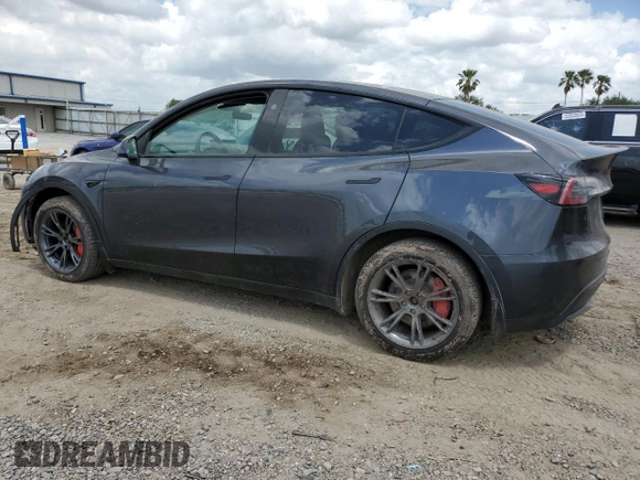 2024 Tesla Model Y Long Range with VIN 7SAYGDEE4RA316722, listed as a Copart auction lot 53207395 with 17,006 mi miles and Salvage title. Bid and sale history available at DreamBid. Image 2.