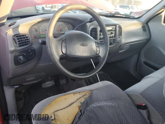 2000 Ford F-150 XL z VIN 1FTPF17L6YNA37670, wystawiony jako Copart lot #83479314 z przebiegiem 205 364 mil mil oraz Szkoda całkowita • Salvage title. Historia ofert i sprzedaży dostępna na DreamBid. Obrazek 8.