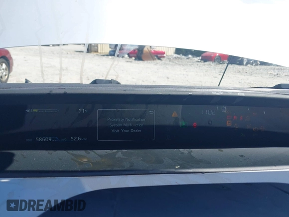 2020 Toyota Prius L Eco z VIN JTDKARFUXL3125434, wystawiony jako IAAI lot #42201623 z przebiegiem 58 609 mil mil oraz . Historia ofert i sprzedaży dostępna na DreamBid. Obrazek 7.