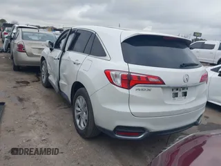 2017 Acura RDX with VIN 5J8TB3H31HL011012, listed as a IAAI auction lot 41504854 with 165,266 mi miles. Bid and sale history available at carsss.com. Image 3.