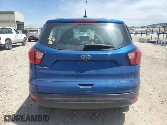 2019 Ford Escape S с VIN 1FMCU0F79KUB58432, выставлен на аукционе Copart как лот 57071095 с пробегом 111 471 миль миль и Списание • Salvage title. История ставок и продаж доступна на DreamBid. Изображение 6.
