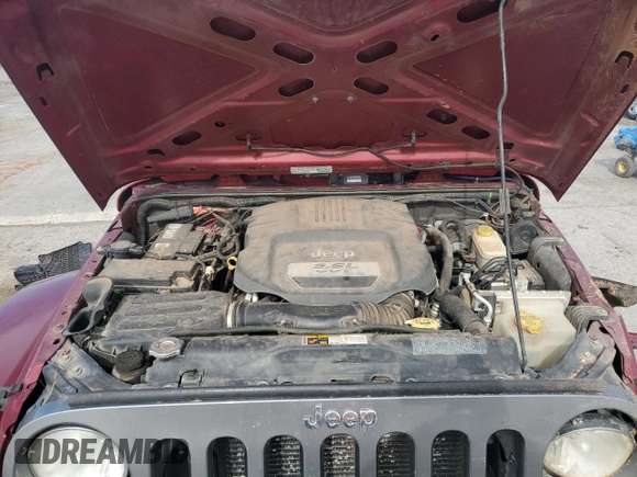 2013 Jeep Wrangler Unlimited Freedom z VIN 1C4BJWDG7DL582764, wystawiony jako Copart lot #54133275 z przebiegiem 183 507 mil mil oraz Szkoda całkowita • Salvage title. Historia ofert i sprzedaży dostępna na DreamBid. Obrazek 12.
