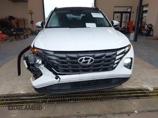 2022 Hyundai Tucson SEL Convenience with VIN KM8JFCA1XNU075554, listed as a IAAI auction lot 41617350 with 29,676 mi miles and . Bid and sale history available at carsss.com. Image 6.