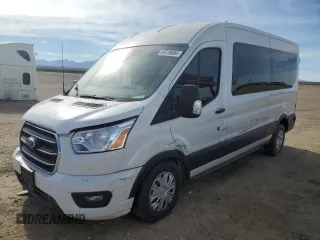 2020 Ford Transit Passenger XL with VIN 1FBAX2C89LKA24856, listed as a Copart auction lot 86316684 with 93,910 mi miles and Salvage Title. Bid and sale history available at DreamBid. Image 1.