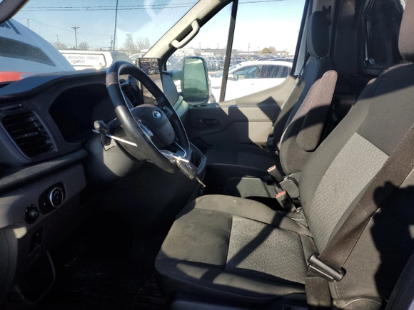 2023 Ford Transit Cargo Van with VIN 1FTBR2C83PKA13044, listed as a Copart auction lot 42591995 with 140,564 mi miles and Clean Title. Bid and sale history available at carsss.com. Image 7.