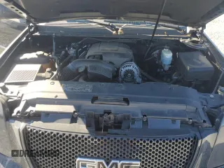 2011 GMC Yukon Denali with VIN 1GKS1EEFXBR121055, listed as a Copart auction lot 77194354 with 98,806 mi miles and Salvage Title. Bid and sale history available at carsss.com. Image 14.