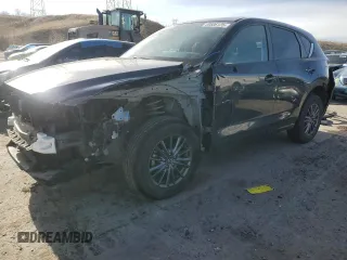 2021 Mazda CX-5 Touring with VIN JM3KFBCM6M0317800, listed as a Copart auction lot 48506125 with 33,746 mi miles and Salvage Title. Bid and sale history available at carsss.com. Image 1.
