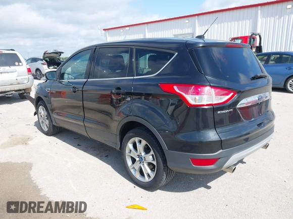 2013 Ford Escape SEL with VIN 1FMCU9HX1DUB97939, listed as a IAAI auction lot 42293561 with 196,951 mi miles and . Bid and sale history available at DreamBid. Image 3.