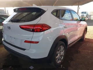 2020 Hyundai Tucson SE with VIN KM8J2CA40LU210821, listed as a IAAI auction lot 41494300 with 35,281 mi miles. Bid and sale history available at carsss.com. Image 4.