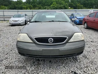 2001 Mercury Sable with VIN 1MEFM53U01A627026, listed as a Copart auction lot 57355804 with 248,244 mi miles and Salvage title. Bid and sale history available at DreamBid. Image 5.