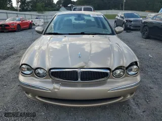 2003 Jaguar X-Type 2.5L Manual with VIN SAJEA51D93XD03179, listed as a Copart auction lot 72574844 with 134,414 mi miles and Salvage Title. Bid and sale history available at carsss.com. Image 5.