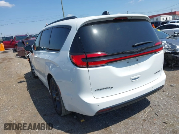 2023 Chrysler Pacifica Limited with VIN 2C4RC1GG6PR540220, listed as a IAAI auction lot 42009535 with 29,339 mi miles and . Bid and sale history available at DreamBid. Image 3.
