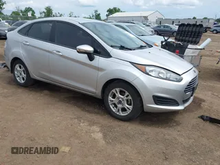 2016 Ford Fiesta SE z VIN 3FADP4BJ9GM157565, wystawiony jako IAAI lot #42402402 z przebiegiem 140 593 mil mil oraz . Historia ofert i sprzedaży dostępna na DreamBid. Obrazek 1.