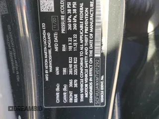 2021 Aston Martin DBX z VIN SCFVUJAWXMTV01292, wystawiony jako Copart lot #83824504 z przebiegiem Nie podano mil oraz Szkody całkowita. Historia ofert i sprzedaży dostępna na DreamBid. Obrazek 12.