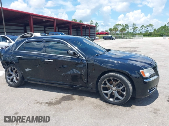 2014 Chrysler 300 C with VIN 2C3CCAKT9EH171614, listed as a IAAI auction lot 39747704 with 129,156 mi miles and . Bid and sale history available at carsss.com. Image 6.