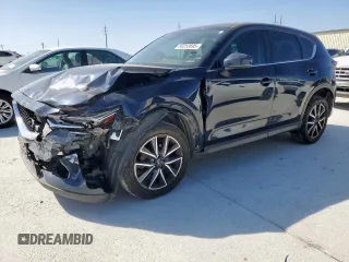 2017 Mazda CX-5 Grand Touring with VIN JM3KFBDL1H0147700, listed as a Copart auction lot 50253695 with 86,724 mi miles and Salvage Title. Bid and sale history available at carsss.com. Image 1.